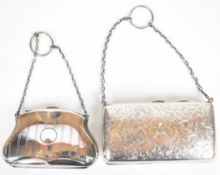 Two hallmarked silver evening purses, the larger Birmingham 1921, maker's mark D Bros, the other