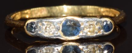 An 18ct gold ring set with sapphires and diamonds, 1.4g, size K