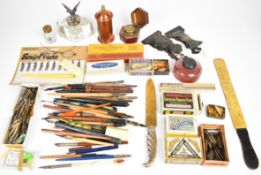 Inkwells including a glass example with eagle finial, letter opener with postal information,