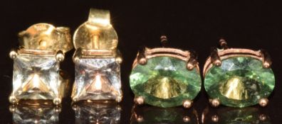 Two pairs of 9k gold earrings, one pair set with oval cut Russian apatite and the other pair