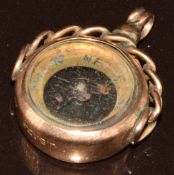 A 9ct gold compass charm, 4.3g