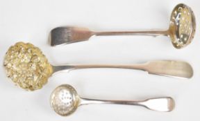 Three Georgian and later hallmarked silver Fiddle pattern sifter ladles comprising smallest London