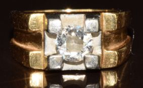 An 18ct gold ring set with a round brilliant cut diamond of approximately 0.65ct in a platinum