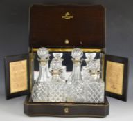 Remy Martin cognac safe with double hinged lid, mirrored interior and hinged side doors,