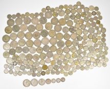 A large collection of pre-1947 silver coinage, approximately 1.3kg, and approximately 54g of pre-