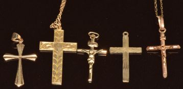 Three 9ct gold cross pendants, two 9ct gold crucifixes and four chains, 7.4g