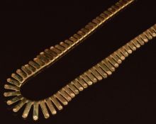 A 9ct gold Cleopatra style necklace, 19.4g, 44cm
