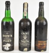 Three bottles of vintage Port comprising Cockburn's 1960, Dow's 1966 and Croft 1970. PLEASE NOTE ALL