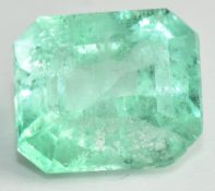 A loose natural emerald cut emerald of approximately 3.2ct, with GIA report