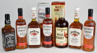 Seven bottles of Bourbon Whisky and Whisky liqueurs comprising Jack Daniel's, Wild Turkey, Jim