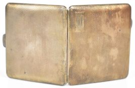 Art Deco hallmarked silver cigarette case with engine turned decoration and gilt interior,