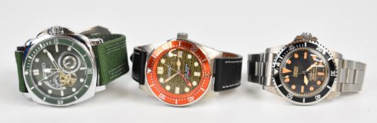Three custom modified Seiko and Seiko style gentleman's automatic wristwatches, one 'Scubamaster'