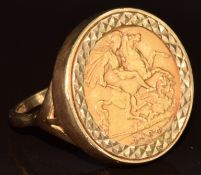 A 9ct gold ring set with a 1904 gold half sovereign, 10.1g, size M