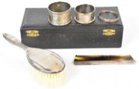 Cased hallmarked silver brush and comb set, length of main brush 18.5cm, Birmingham 1964/6, maker