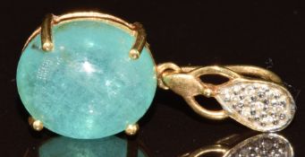 An 18ct gold pendant set with an oval Paraiba tourmaline cabochon and diamonds, 4.2g
