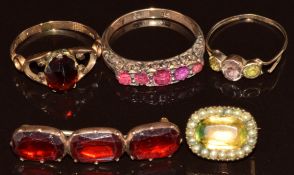 Three Victorian 9ct gold rings, one set with spinel, one amethyst and spinel and one paste, together