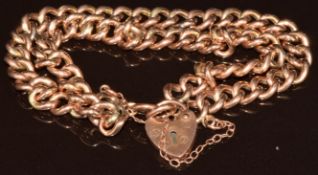 A 9ct gold double strand curb link bracelet with heart padlock clasp, 11.8g, 17cm