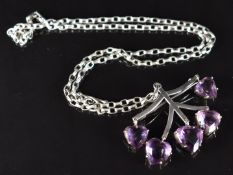 A c1900 silver necklace set with five heart cut amethysts, 13.3g