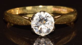 An 18ct gold ring set with a round brilliant cut diamond of approximately 0.58ct, 2.3g, size K