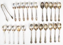 Three sets of hallmarked silver spoons comprising a set of 12 with matching tongs, having twisted