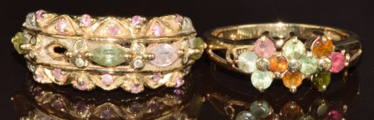Two 9ct gold rings, one set with a ruby, topaz, sapphire, citrine, etc and the other topaz,