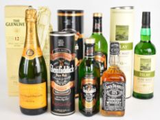 Six bottles of Whisky and Champagne comprising Glenfiddich, Glenlivet, Jack Daniel's, Islay Pure