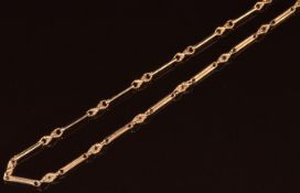 A c1900 9ct gold necklace made up of knotted and elongated links, with bolt clasp, 9.7g, 47cm