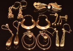 Seven pairs of 9ct gold earrings including faceted hoops, etc, 11.6g