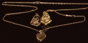 A 9ct gold Buddha pendant, 9ct gold pendant and 9ct gold heart locket on 9ct gold chain, 6.5g
