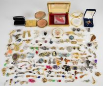 A collection of jewellery including Sarah Coventry earrings, brooches including vintage,