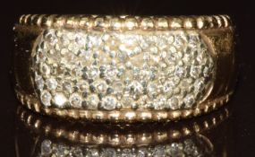 A 9ct gold ring set with diamonds, 6.8g, size N