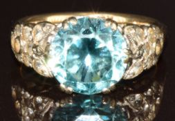 A 9ct gold ring set with a zircon of approximately 2.5ct and quartz, 4.3g, size J