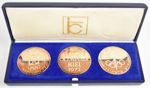 Intercoin set of three Kiel Olympics 1972 silver medallions, each marked 1000, weight of all three