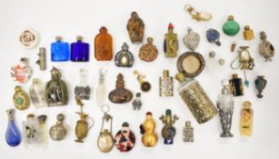A large collection of scent / perfume and snuff bottles including Chinese, Tibetan, cameo,
