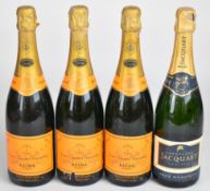 Four bottles of vintage Champagne comprising three Veuve Clicquot Ponsardin 12% vol and one Jacquart