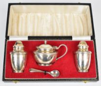 Elizabeth II hallmarked silver three piece cruet set comprising salt, pepper, mustard and silver