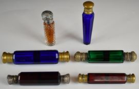 Six scent / perfume bottles, four double ended and a hallmarked silver mounted cut glass example,