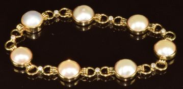 An 18ct gold bracelet set with split cultured pearls and diamonds, 21.3g, 18cm