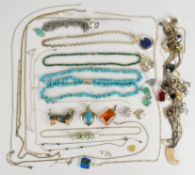 A collection of silver jewellery including turquoise necklace, malachite necklace, pressed amber