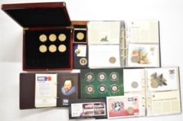 Twenty seven WWF coin covers in branded ring binders, eighteen London Mint Office Great British