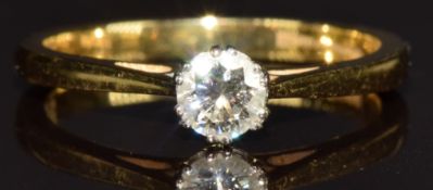 An 18ct gold ring set with a round brilliant cut diamond of approximately 0.28ct, 2.6g, size L