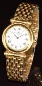 Baume & Mercier 18ct gold ladies wristwatch with blued hands, black Roman numerals, white dial and