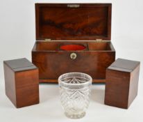19th century flame mahogany tea caddy with mother of pearl escutcheon and raised on four squat bun