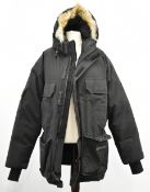Canada Goose Expedition gentleman's parka in black, with branding to left pocket and zip pull, and
