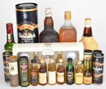 A collection of mostly Scotch single malt and blended whiskies of various sizes to include Haig,