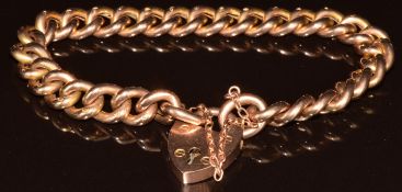 A 9ct rose gold curb link bracelet with heart padlock clasp, London 1905, 14.1g, 18cm
