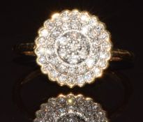 A 9k gold ring set with a cluster of diamonds from the Argyle mine, total diamond weight 0.5ct,