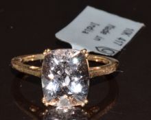 A 9ct gold ring set with a cushion cut Alto Ligonha morganite of approximately 3.5ct, limited