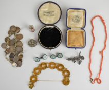 A pair of guilloché enamel cufflinks, silver brooch set with marcasite, paste clip, coral