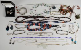 A collection of silver jewellery including Clogau locket and chain, pendant set with labradorite,